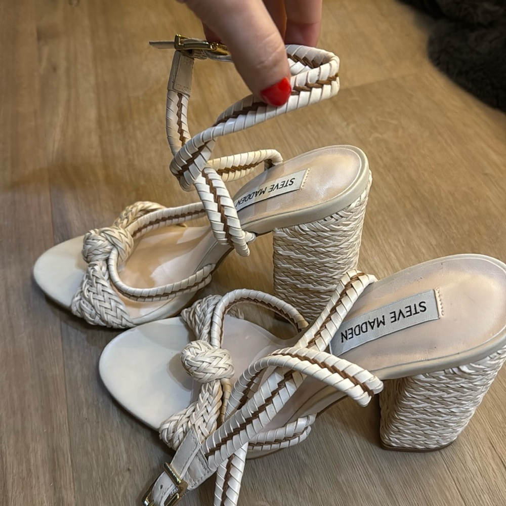 Brand new - never worn. Size 7. Wedge with strap